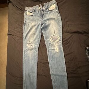 Express mid-rise legging Jean size 8 distressed